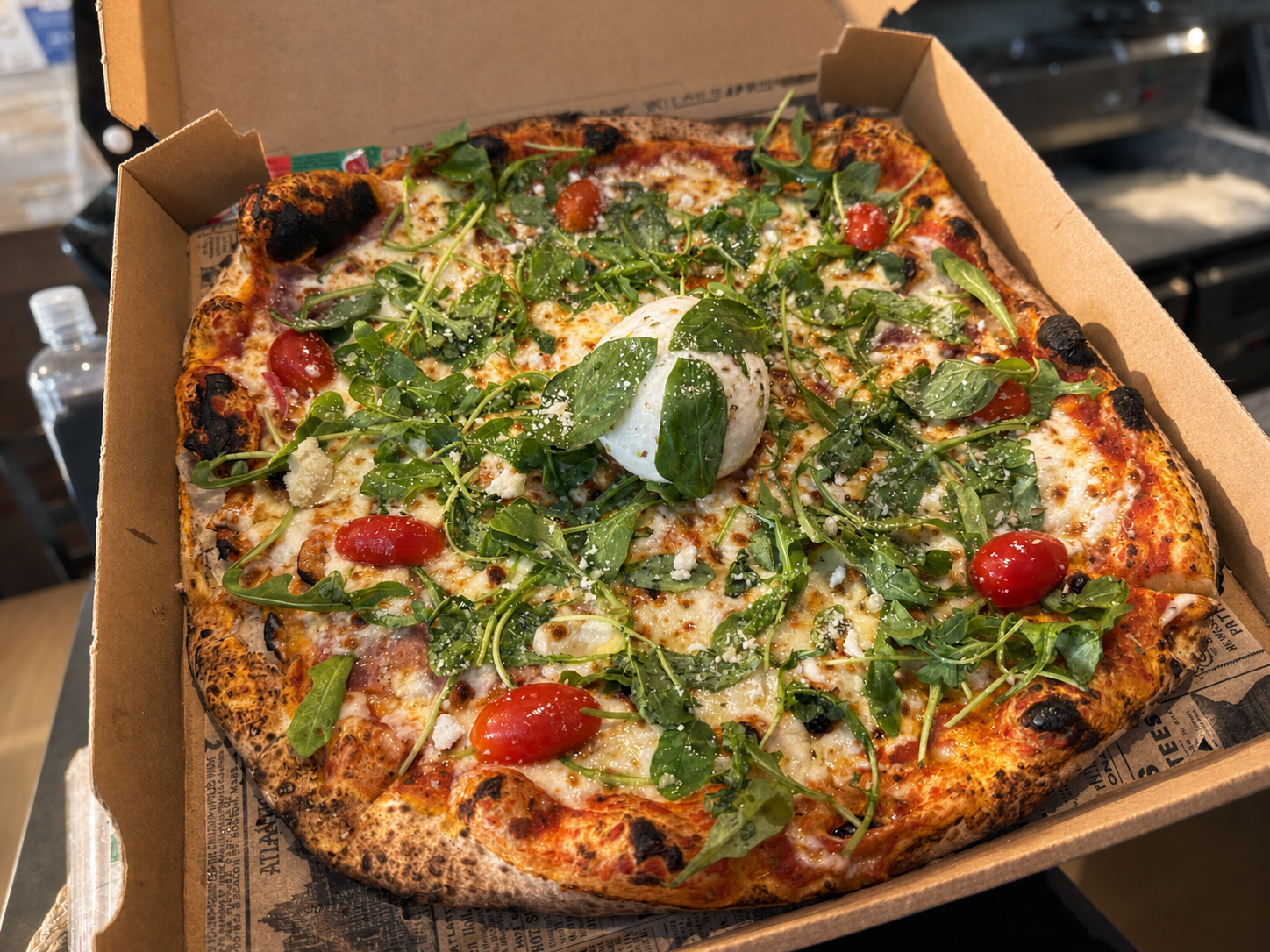 Del Totorino la pizza au feu de bois — une assiette